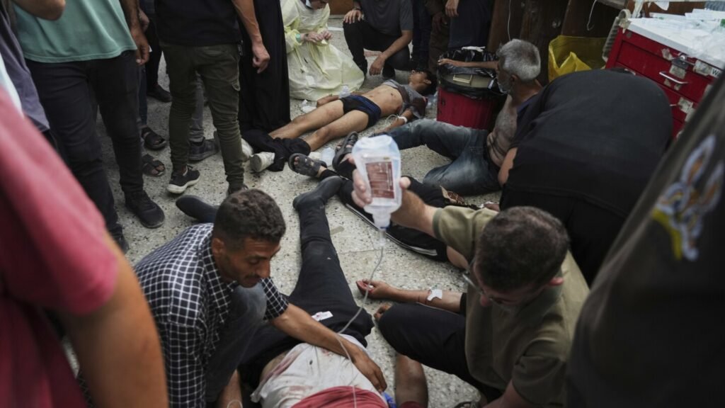 67 killed in Gaza as Israeli forces strike a cafe and fire on people seeking food