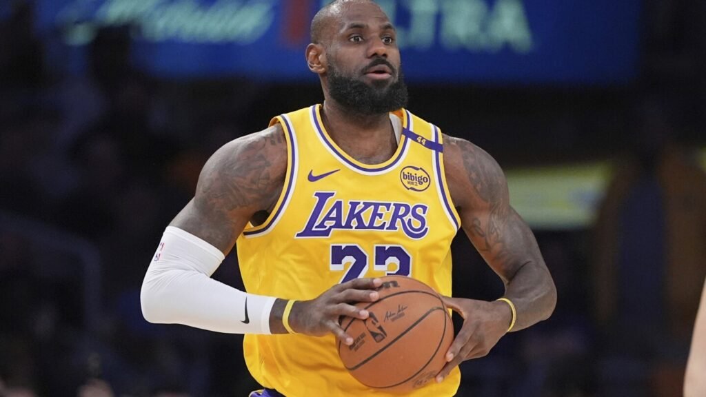 LeBron James formally opts in for a 23rd season, will make $52.6M in 2025-26, AP source says