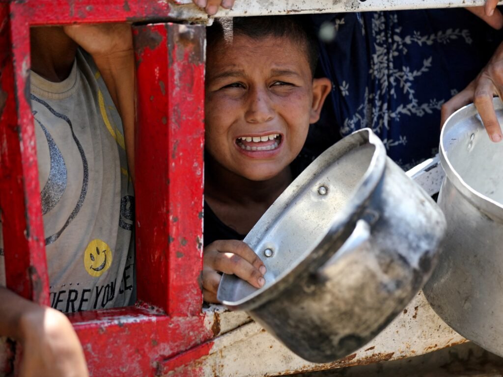 ‘Flour, fire and fear as I try to parent in a starving Gaza’