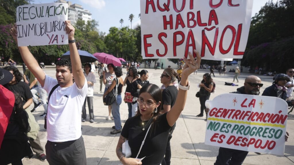 Mexico's president calls march against mass tourism 'xenophobic.' Critics blame government failures