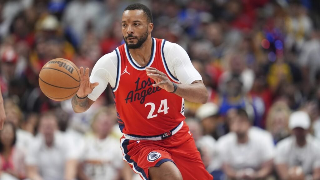 Powell joining Heat, Collins to Clippers, Love and Anderson to Utah in 3-team trade, AP source says