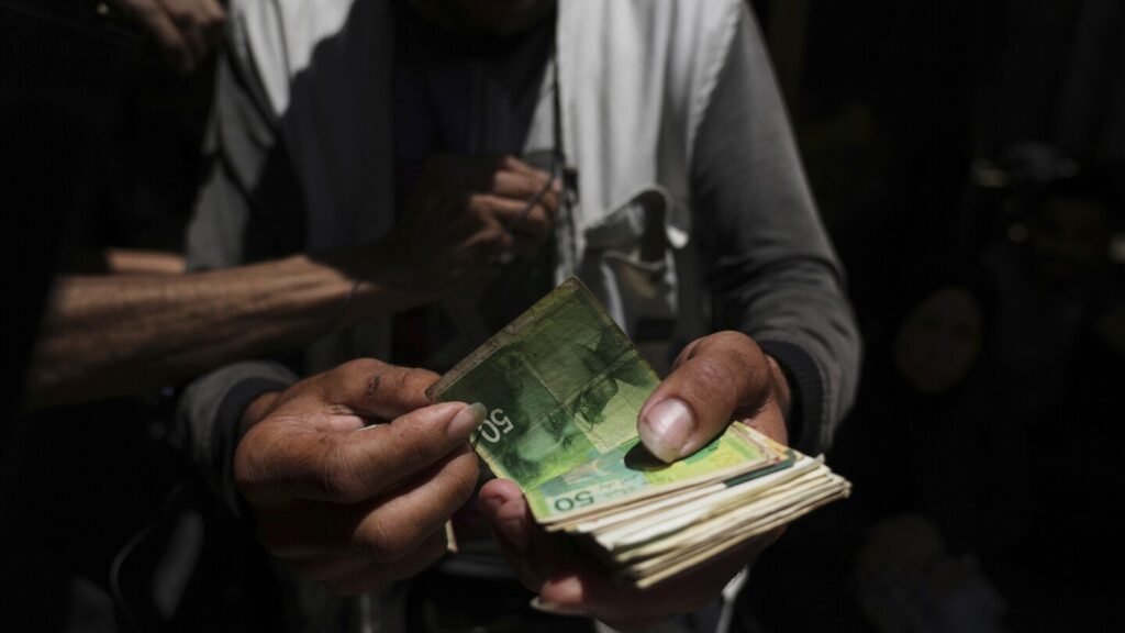 To get their own cash, people in Gaza must pay middlemen a 40% cut