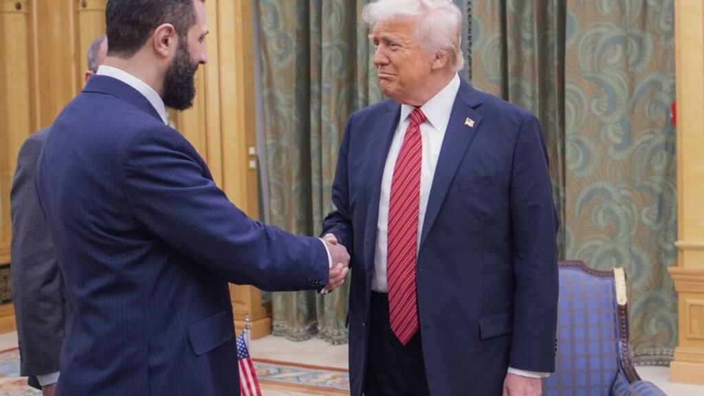 Trump signs an executive order ending US sanctions on Syria