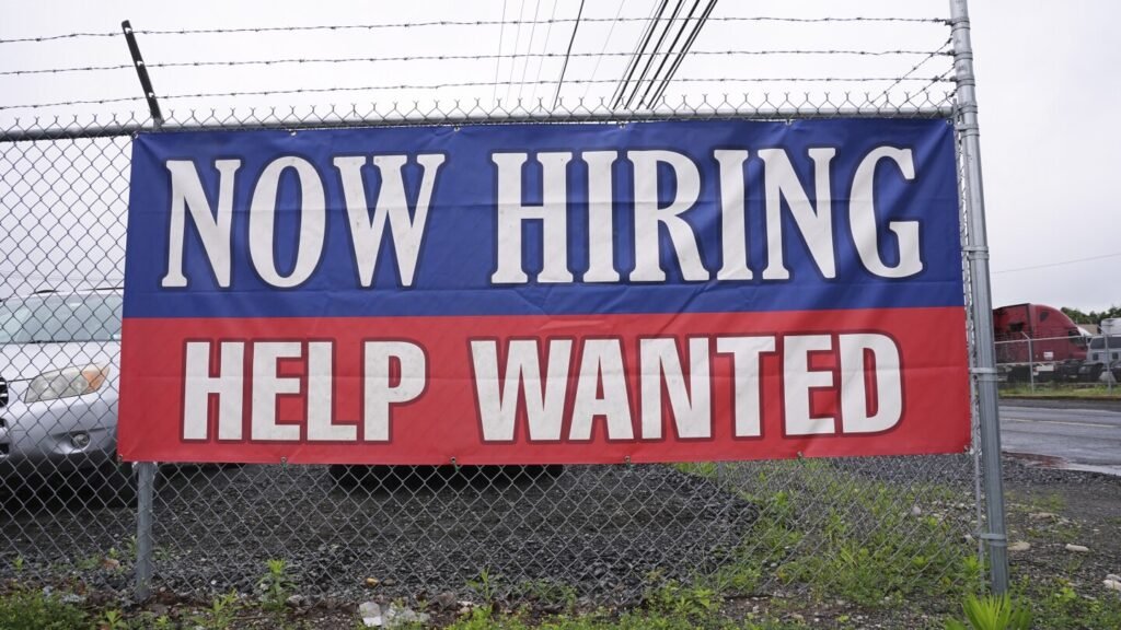 U.S. applications for jobless aid fell to 233,000 last week as layoffs remain low