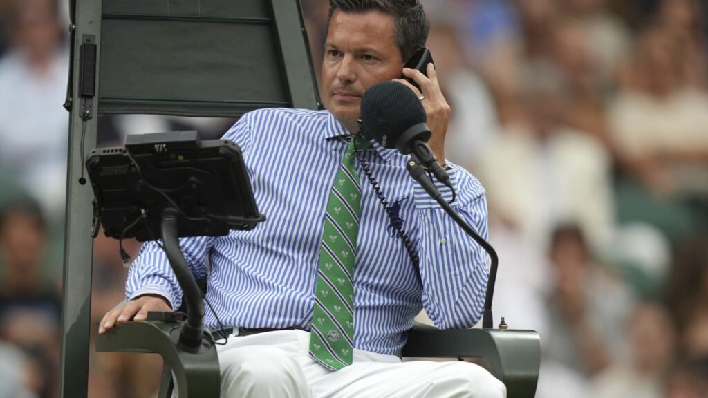 Why is Wimbledon blaming human error for a mistake by its new electronic line-calling system?