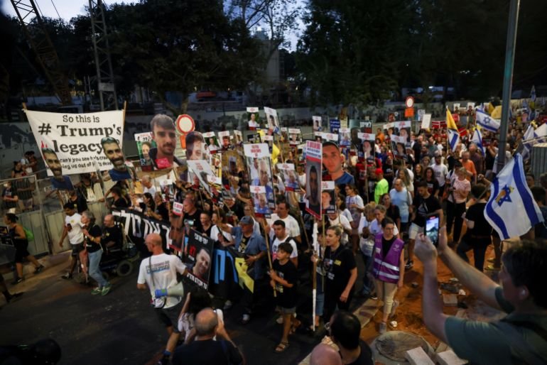 Protesters take part in a rally to demand the immediate end of the war [Shir Torem/Reuters]