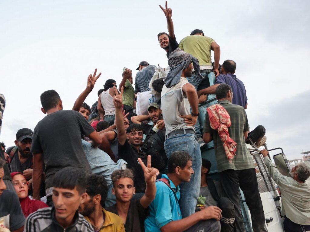 At least 20 Palestinians killed after aid truck overturns in central Gaza