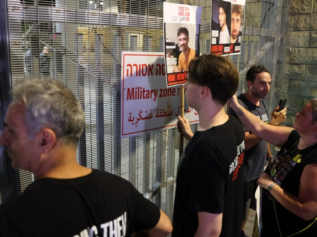 Israeli captive families confront police outside army headquarters
