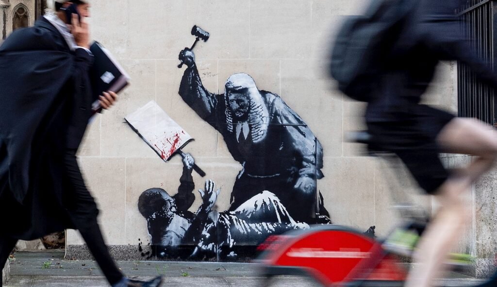 Banksy mural shows judge beating protester amid Palestine Action crackdown