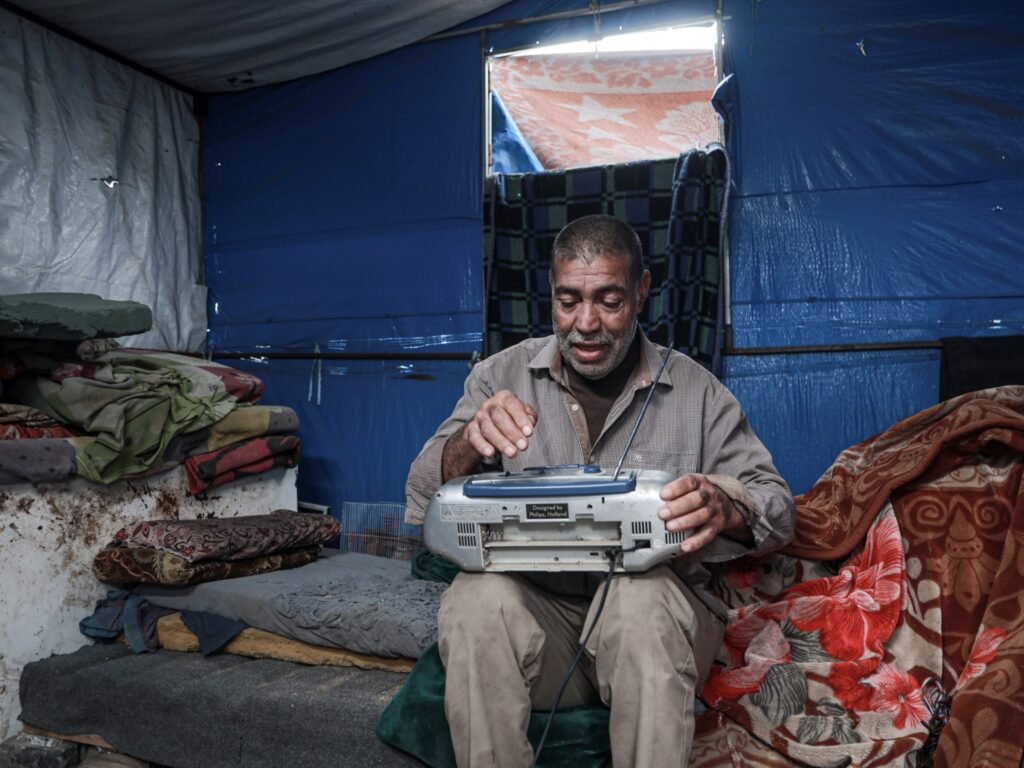 Palestinians in Gaza worry and wait for Israel to implement ceasefire