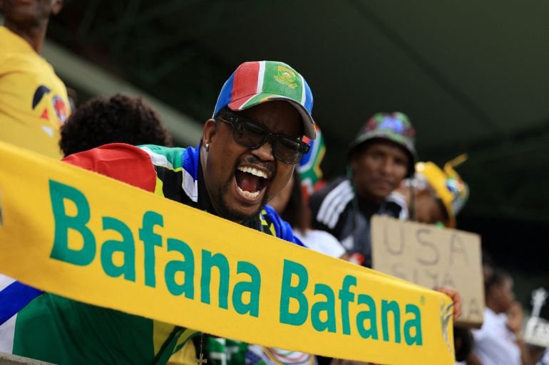 South Africa fans celebrate after qualifying for the FIFA World Cup