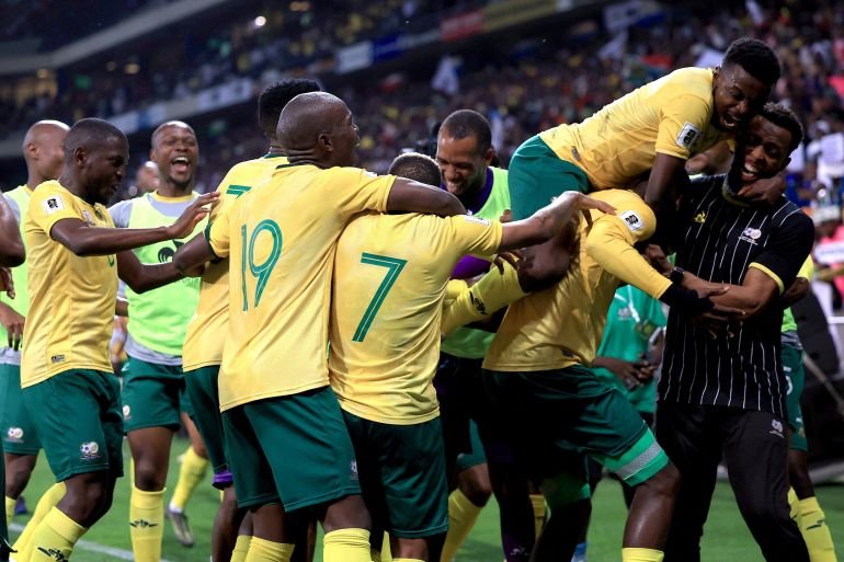 South Africa fans celebrate after qualifying for the FIFA World Cup