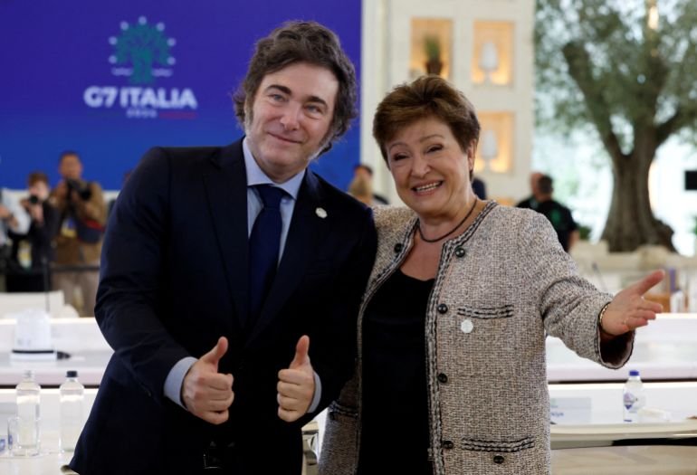 Managing Director of the International Monetary Fund (IMF) Kristalina Georgieva and Argentina's President Javier Milei talk ahead of a session on Artificial Intelligence (AI), Energy, Africa and Mediterranean on the second day of the G7 summit in Borgo Egnazia, Italy, June 14, 2024. REUTERS/Louisa Gouliamaki/File Photo NO RESALES. NO ARCHIVES