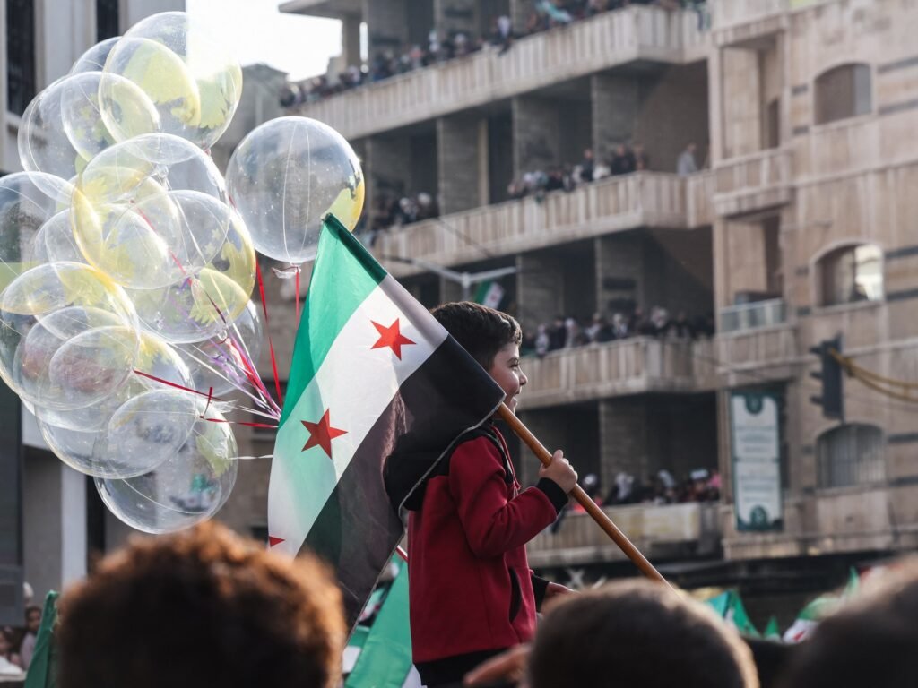 Hope, flags, fireworks as Syria starts to celebrate a year without al-Assad