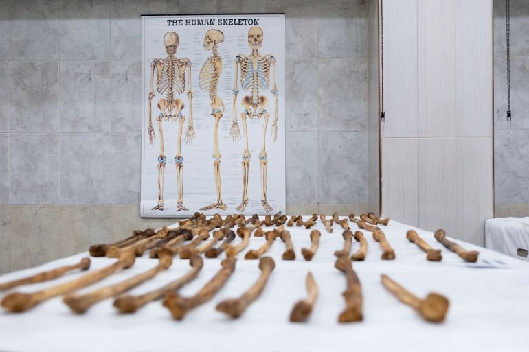  The scale of work ahead for Syria's forensic scientists is difficult to comprehend. This table, covered in femurs, was exhumed from just one mass grave.
