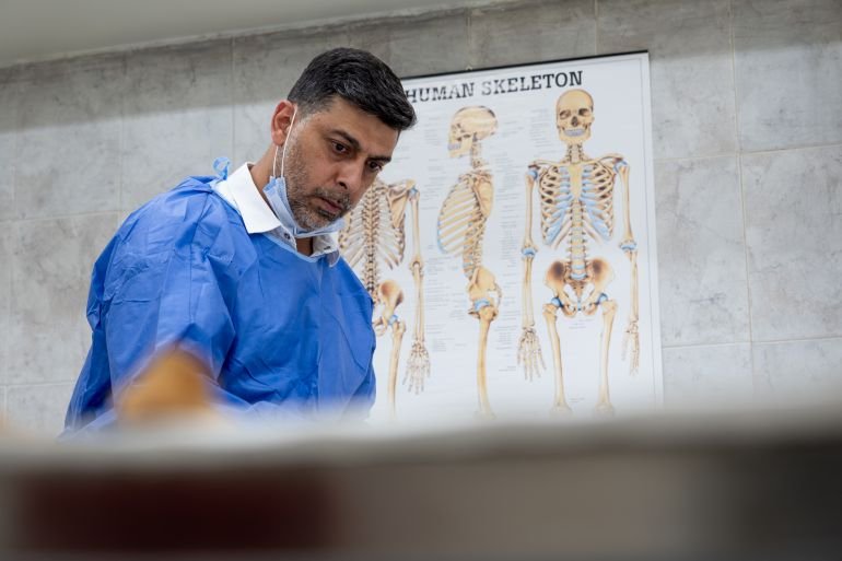  Dr Anas Al Hourani is a forensic odontologist - meaning he studies teeth to help identify a person's remains. [Harriet Tatham/media]
