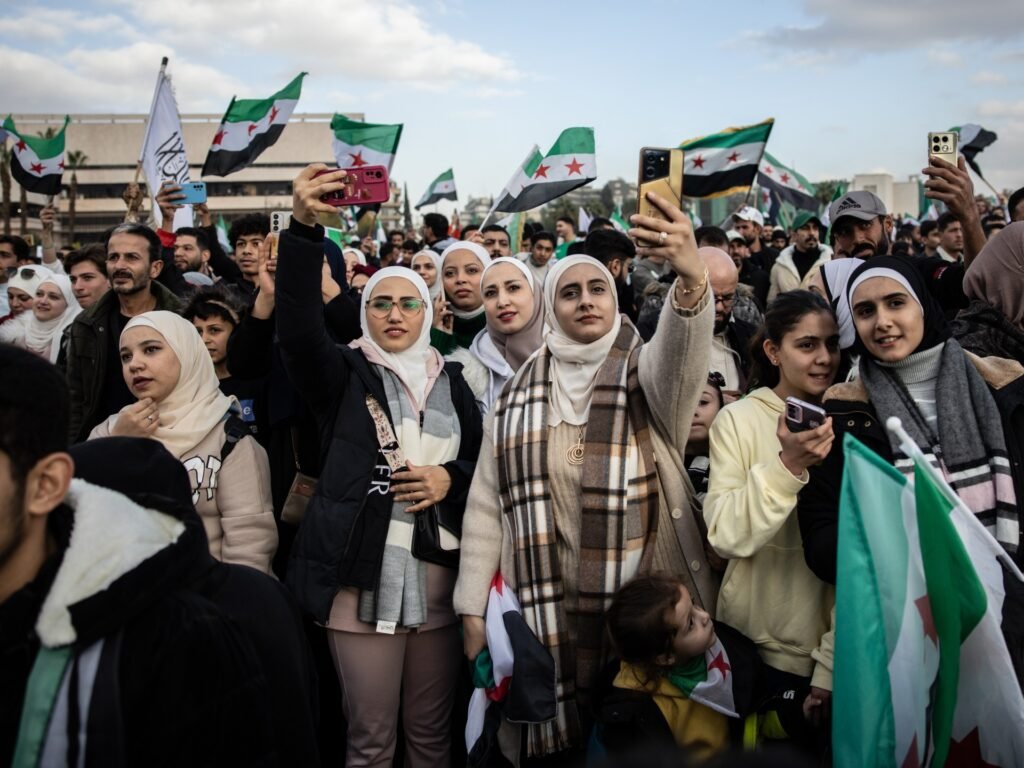 ‘I belong in my own country’: Syrians celebrate a year after al-Assad