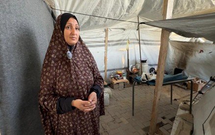 Mervit, a Palestinian mother of 5 children displaced near the Gaza Sea Port.