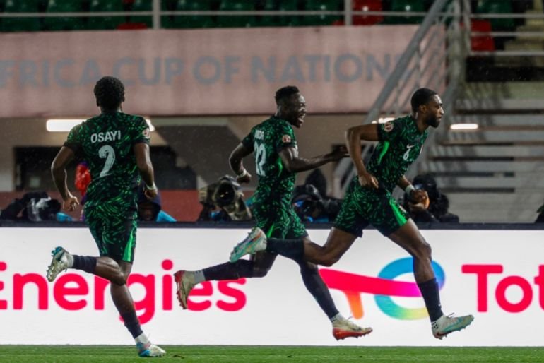 Nigeria's defender #06 Semi Ajayi (R) celebrates his goal during the Africa Cup of Nations