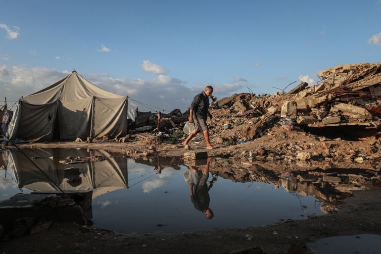Flooding hits displaced Palestinians’ tents after heavy rain in Gaza