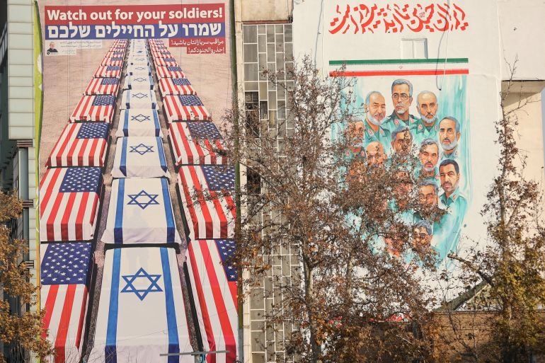 FILE PHOTO: An anti-U.S. and anti-Israeli billboard is displayed on a building in Tehran, Iran, January 4, 2026. Majid Asgaripour/WANA (West Asia News Agency) via REUTERS ATTENTION EDITORS - THIS PICTURE WAS PROVIDED BY A THIRD PARTY/File Photo