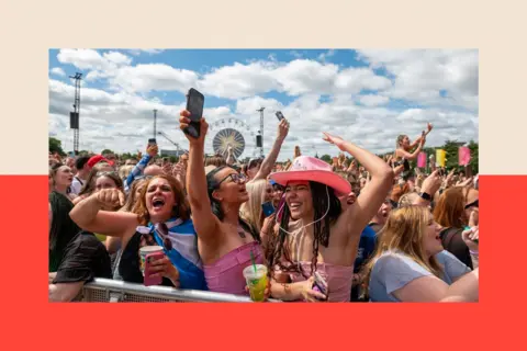 Getty Images A group of young people enjoy music at a festival 