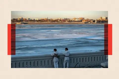 Bloomberg via Getty Images Members of the People's Liberation Army stand guard across from Blagoveshchensk, Russia, by the Amur River in Heihe, Heilongjiang province, China

