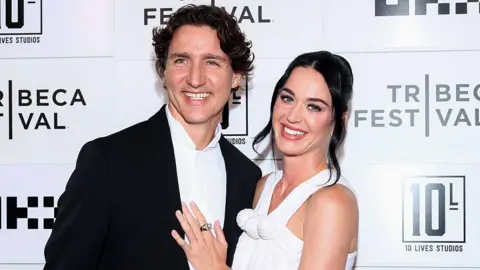 Getty Images Justin Trudeau and Katy Perry at the Tribeca Festival's World Premiere of "Katy Perry: The Lifetimes Tour - Live from Paris" held at the OKX Theater on June 08, 2026 in New York, New York. 

