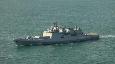 Ministry of Defence Russian frigate Admiral Grigorovich, a large grey vessel 