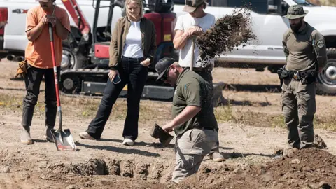 Getty Images Investigators search for animal remains while executing a second search warrant at Miranda's Rescue as part of an active investigation into alleged animal cruelty, fraud and theft, in Fortuna, California.