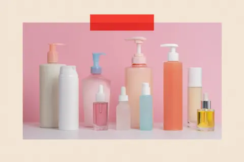 Getty Images Various skincare bottles on pink background 
