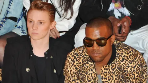 Getty Images Elly Jackson of La Roux (L) and Kanye West attend the Vivienne Westwood Ready to Wear Autumn/Winter 2011/2012 show during Paris Fashion Week at Pavillon Concorde on March 4, 2011 in Paris, France