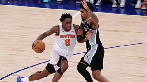Getty Images  OG Anunoby #8 of the New York Knicks drives to the basket against Dylan Harper #2 of the San Antonio Spurs during the second quarter in Game Four of the 2026 NBA Finals at Madison Square Garden on June 10, 2026 in New York City.