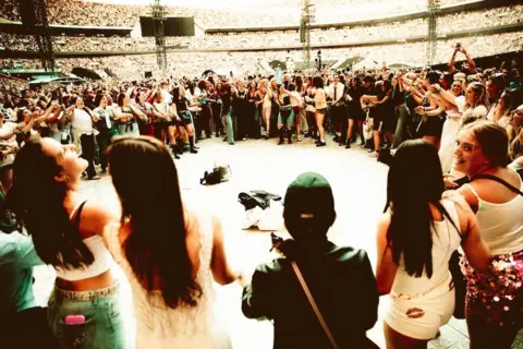 Rosie Carne A huge circle of fans pictured at Harry Styles' concert at Wembley Stadium