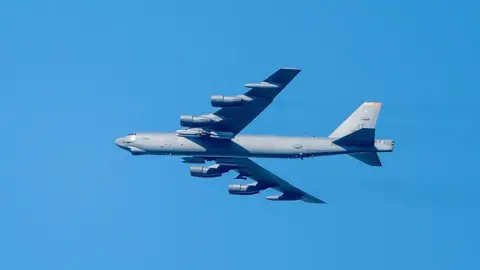 Getty Images A US B-52 Stratofortress bomber seen in the skies above the UK in March