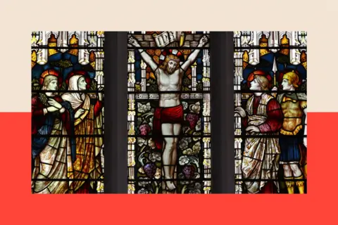 Stained glass window in the church of St Andrew, West Dean, West Sussex