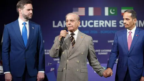 Getty Images Pakistan's Prime Minister Shehbaz Sharif, centre, speaks next to US Vice President JD Vance and Qatar's Prime Minister and Minister for Foreign Affairs Sheikh Mohammed bin Abdulrahman bin Jassim Al-Thani during a quadrilateral meeting between the US, Iran, Pakistan and Qatar at the Lake Lucerne Summit.