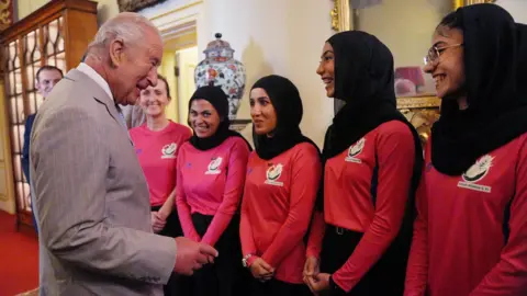 Reuters King Charles meeting the Afghan women's cricket team