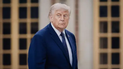 AFP via Getty Images Donald Trump President of the United States of America US on his arrival ahead of a dinner with the President of the French Republic and his wife organised to celebrate the 250th anniversary of the independence of the United States at the Chateau de Versailles in Versailles France on June 17, 2026. 