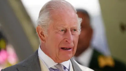 PA Media King Charles head and shoulders in a picture taken at Ascot races in June 2026