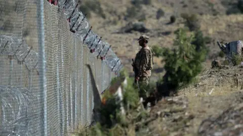 Getty Images File photo of a soldier standing along the Pakistan-Afghanistan border