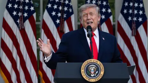 Tierney L. Cross/Getty Images President Donald Trump speaks during a Rose Garden Club dinner at the White House on June 25, 2026 in Washington, DC. Trump hosted US farmers from Iowa in the newly renovated Rose Garden.