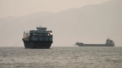 Reuters Vessels in the Strait of Hormuz as seen from Oman on 22 June, 2026.