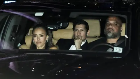 Reuters Jessica Alba and Danny Ramirez in a car leaving the event