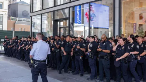 EPA New York Police Department (NYPD) officers pictured stationed outside Madison Square Garden