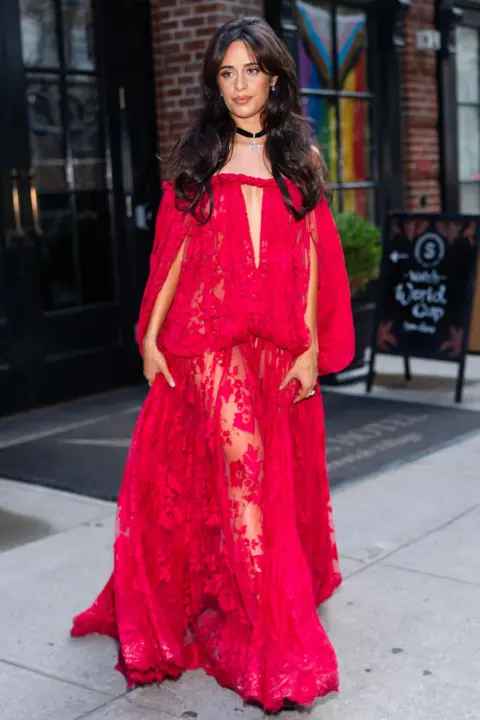 Getty Images Camila Cabello in a long red dress