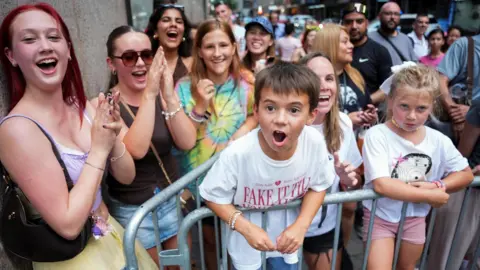 Reuters Taylor Swift fans gather outside of Madison Square Garden, the venue for the reported wedding celebrations of singer Taylor Swift and National Football League (NFL) player Travis Kelce, in New York, U.S., July 3, 2026.

