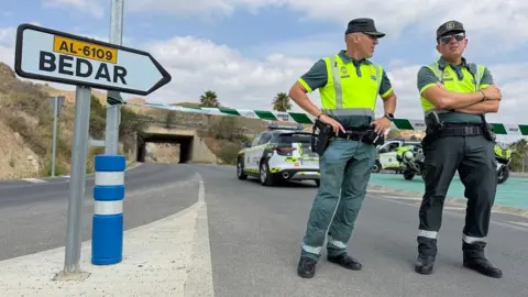 Kostas Kallergis / BBC Two officers stand tktktk