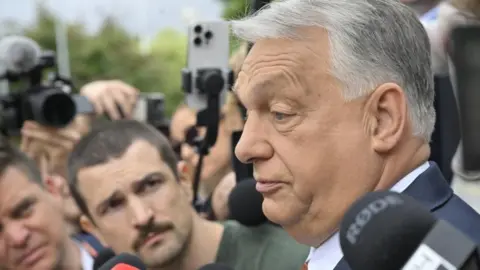 EPA_AutoIngest Former Hungarian Prime Minister Viktor Orbán talks to reporters in Budapest. Photo: 13 June 2026