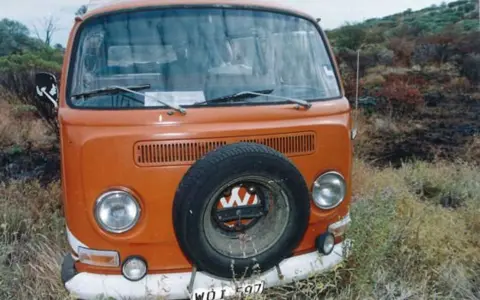 Supplied: NT Police The front of an orange VW Kombi van pictured in bushland 